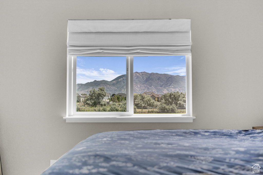 Bedroom with a mountain view