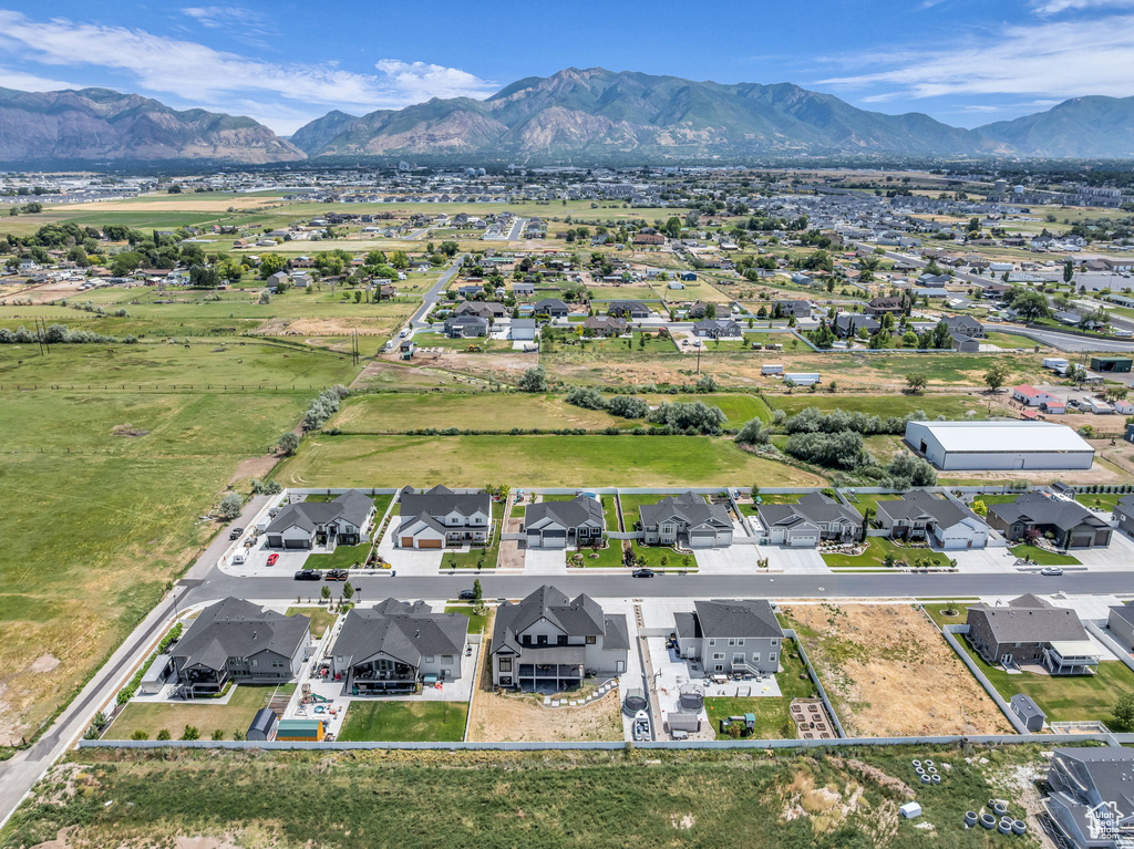 Aerial view of residential area featuring mountains