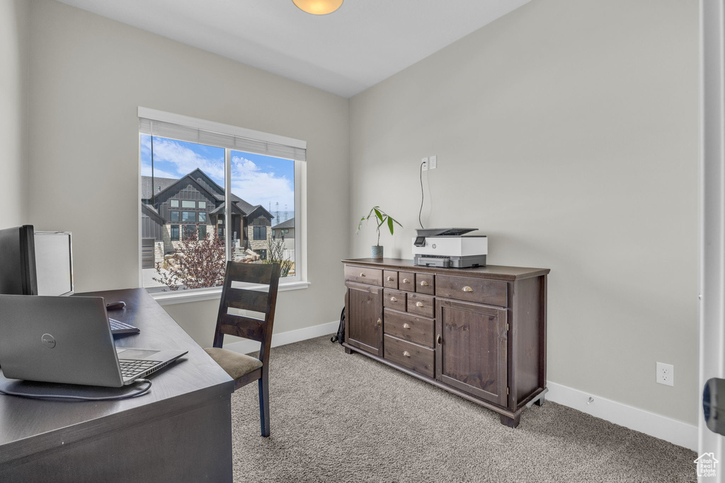 Office with light colored carpet