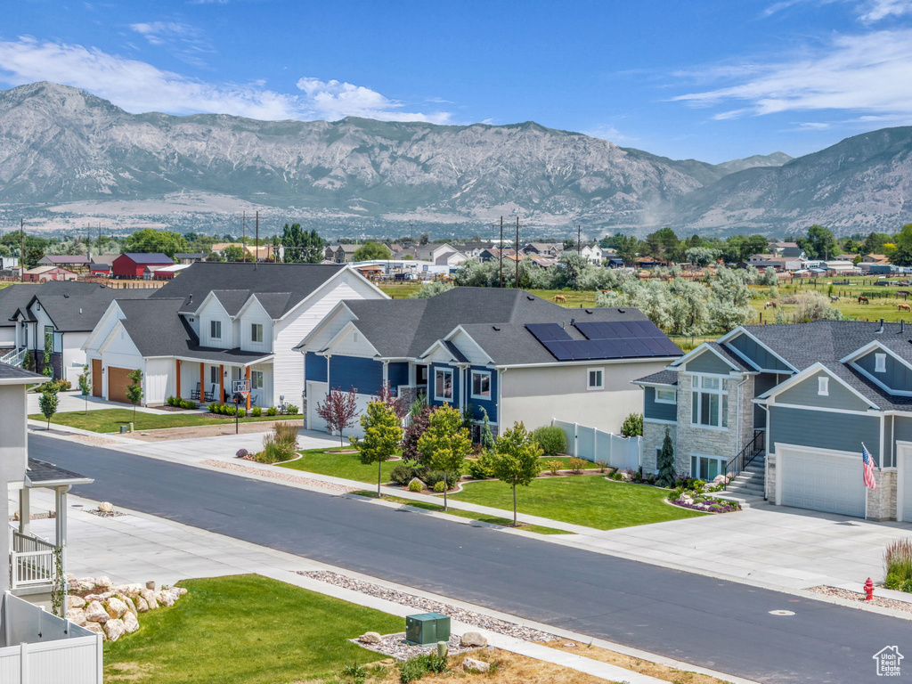 Mountain view featuring nearby suburban area