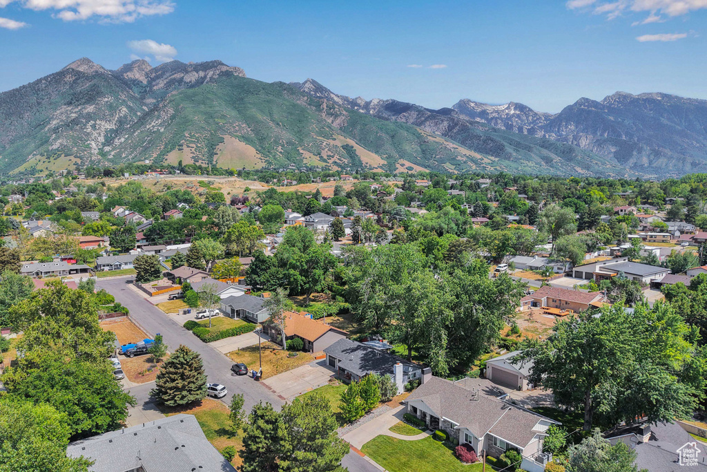 Aerial view of residential area with mountains