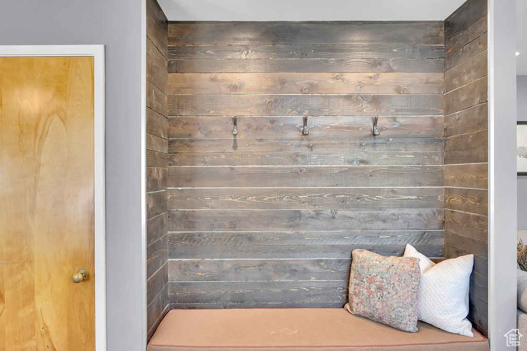 Mudroom with wooden walls