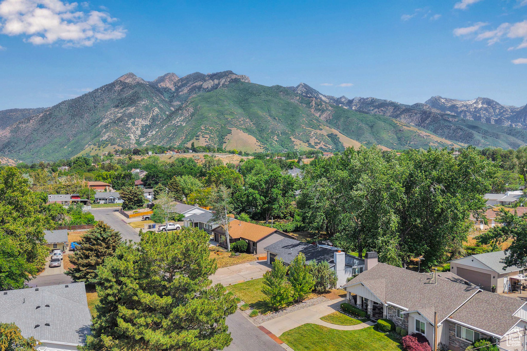 Mountain view featuring nearby suburban area