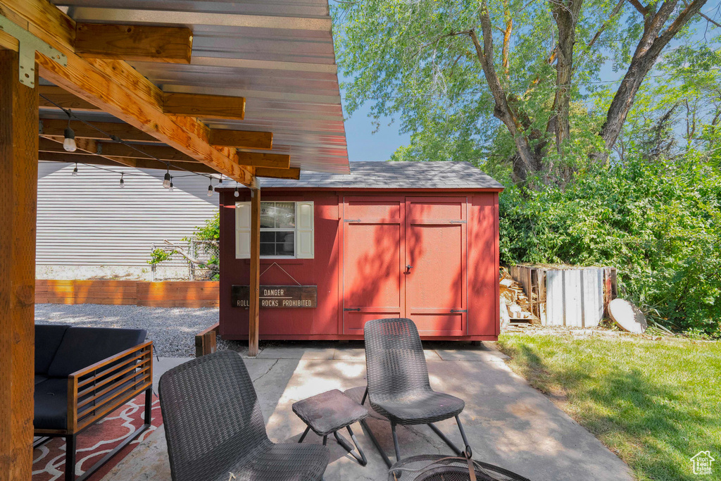 View of patio / terrace with a storage unit