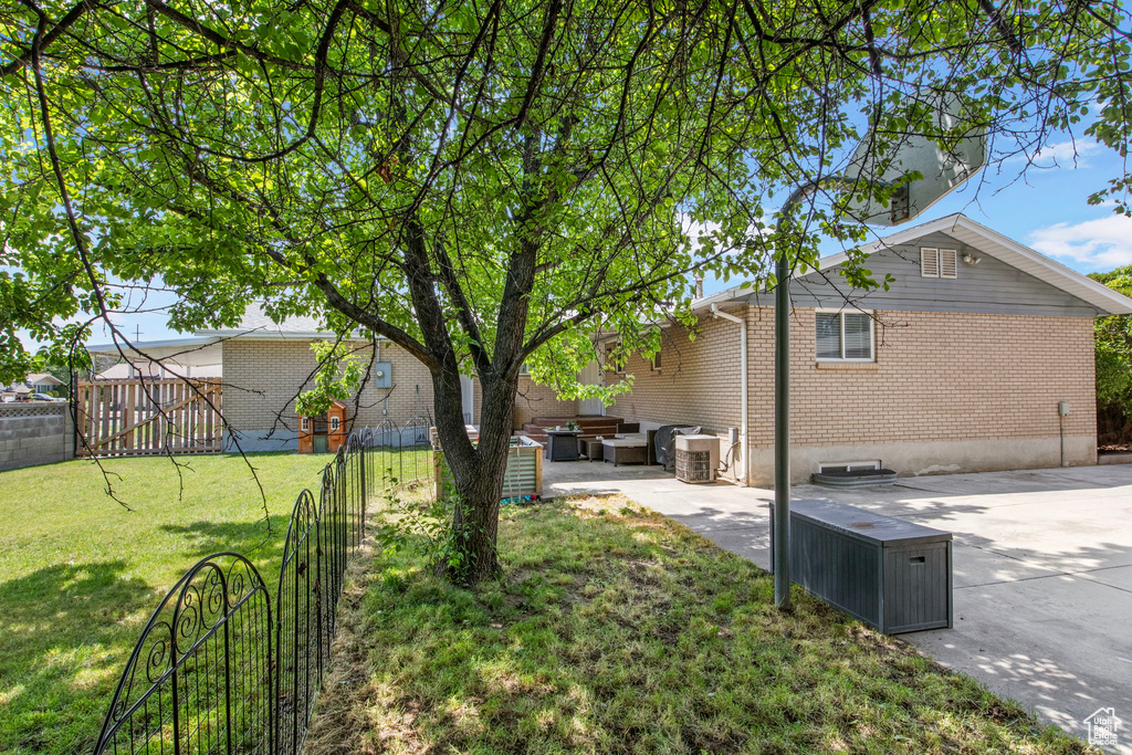 View of yard featuring an outdoor living space and a patio