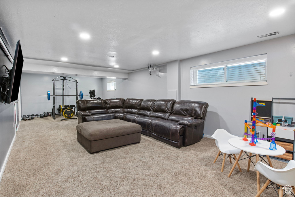 Living room featuring carpet floors and recessed lighting