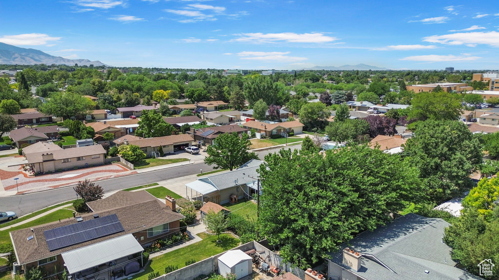 Aerial view of residential area with a mountain backdrop