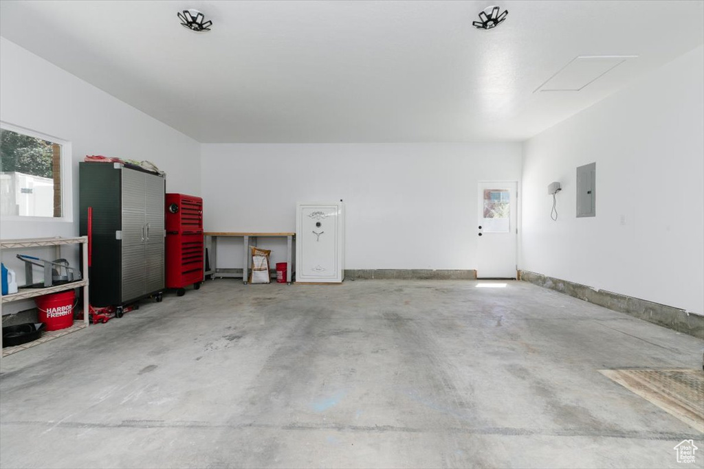 Garage featuring electric panel