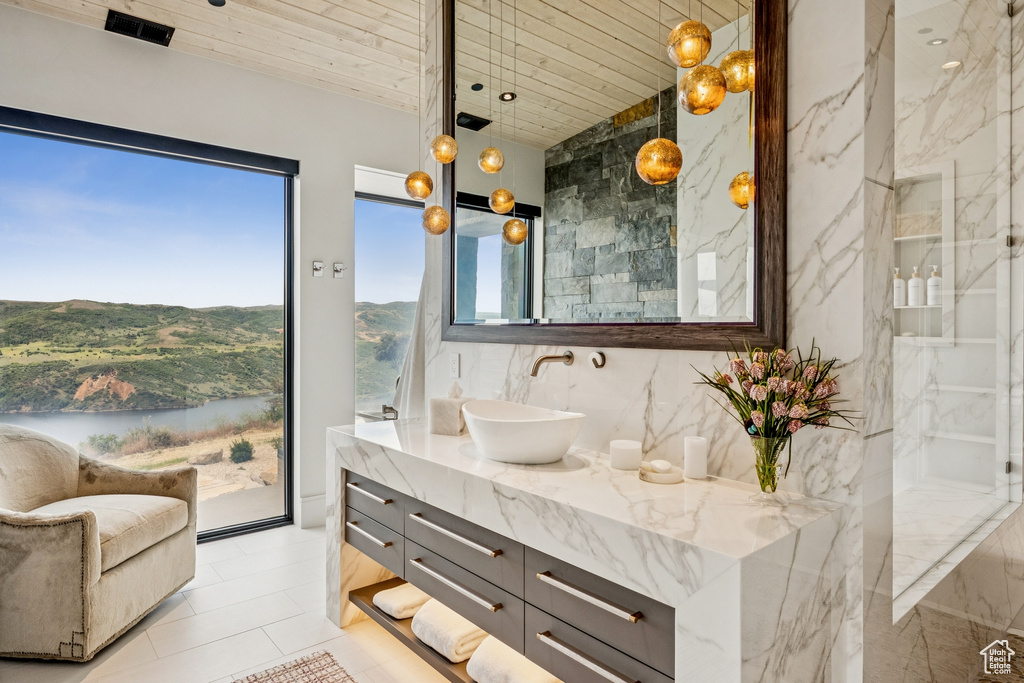 Bathroom featuring vanity and wood ceiling