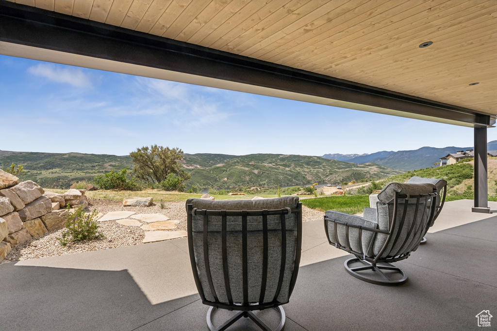 View of patio with a mountain view