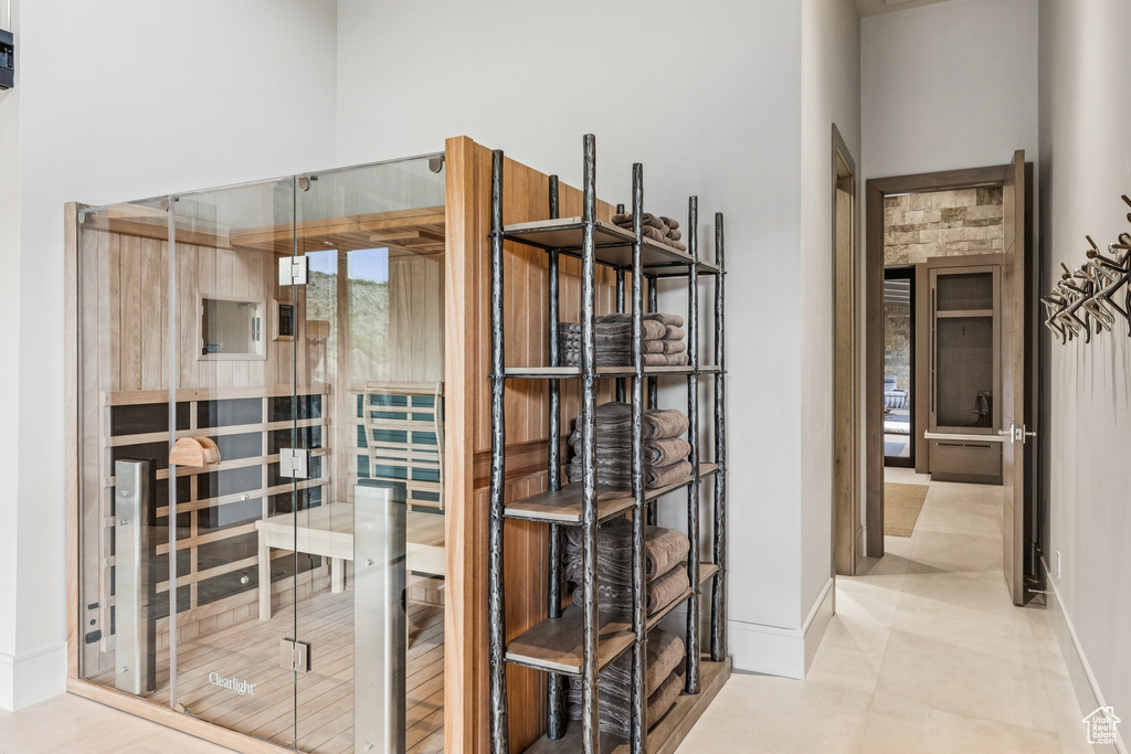Spacious closet featuring tile patterned floors