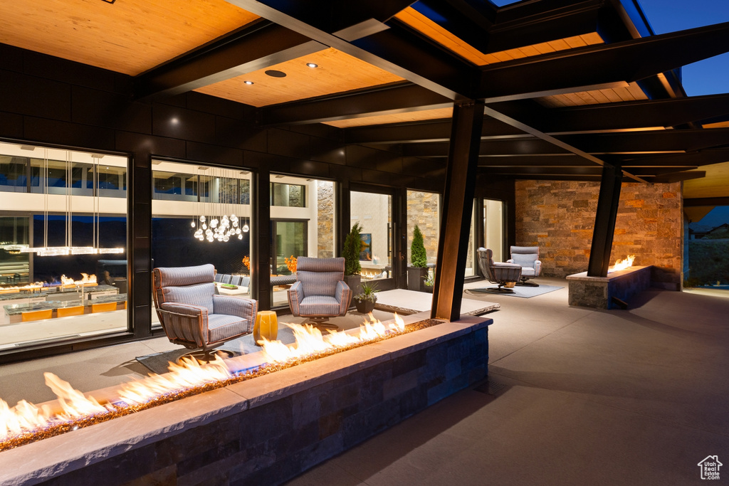 View of patio / terrace featuring an outdoor fire pit