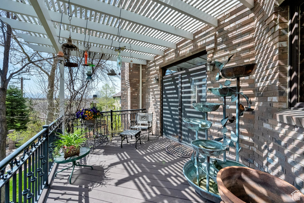 Wooden terrace with a pergola