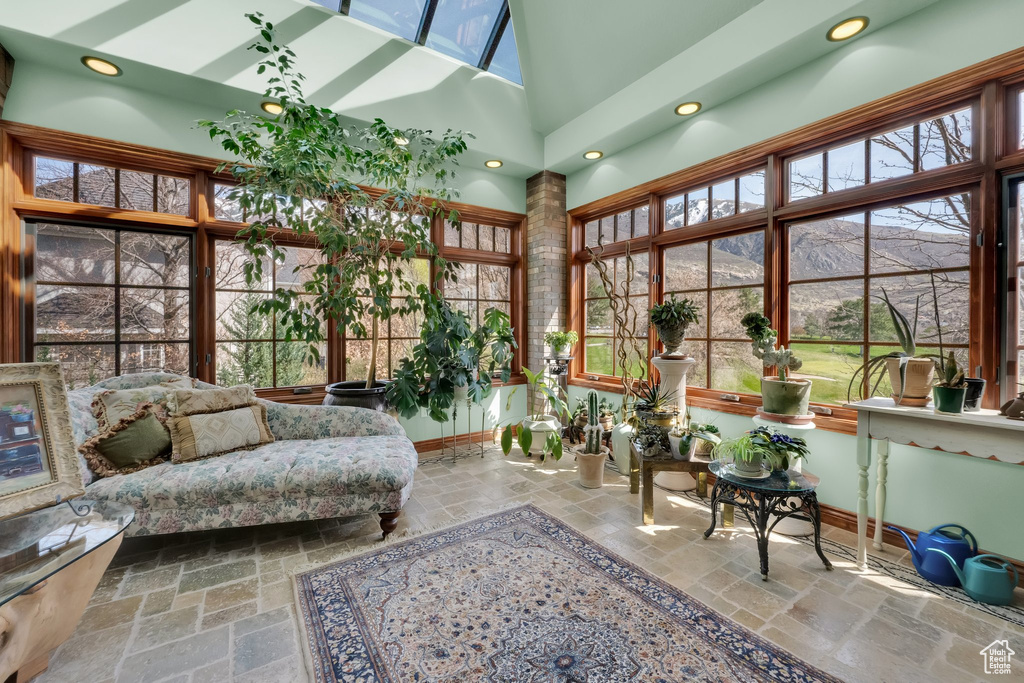 Sunroom / solarium featuring healthy amount of natural light