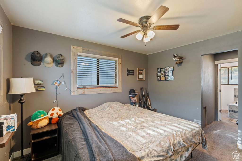 Bedroom featuring carpet floors and a ceiling fan