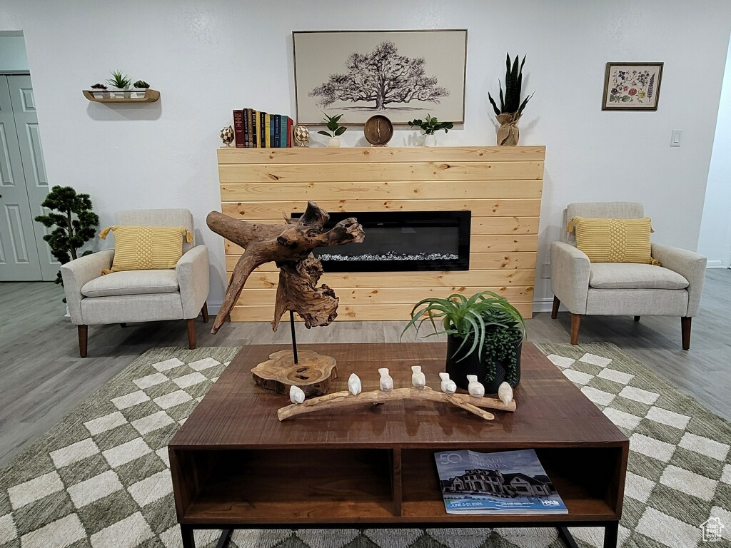 Living area featuring wood finished floors and baseboards