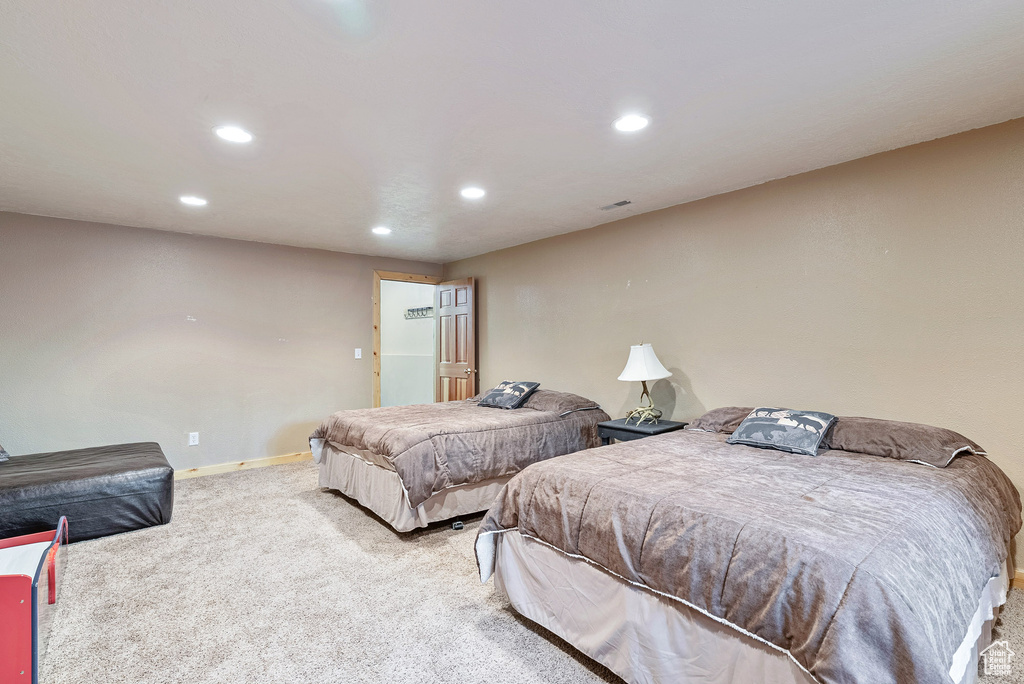 Bedroom featuring carpet flooring and recessed lighting