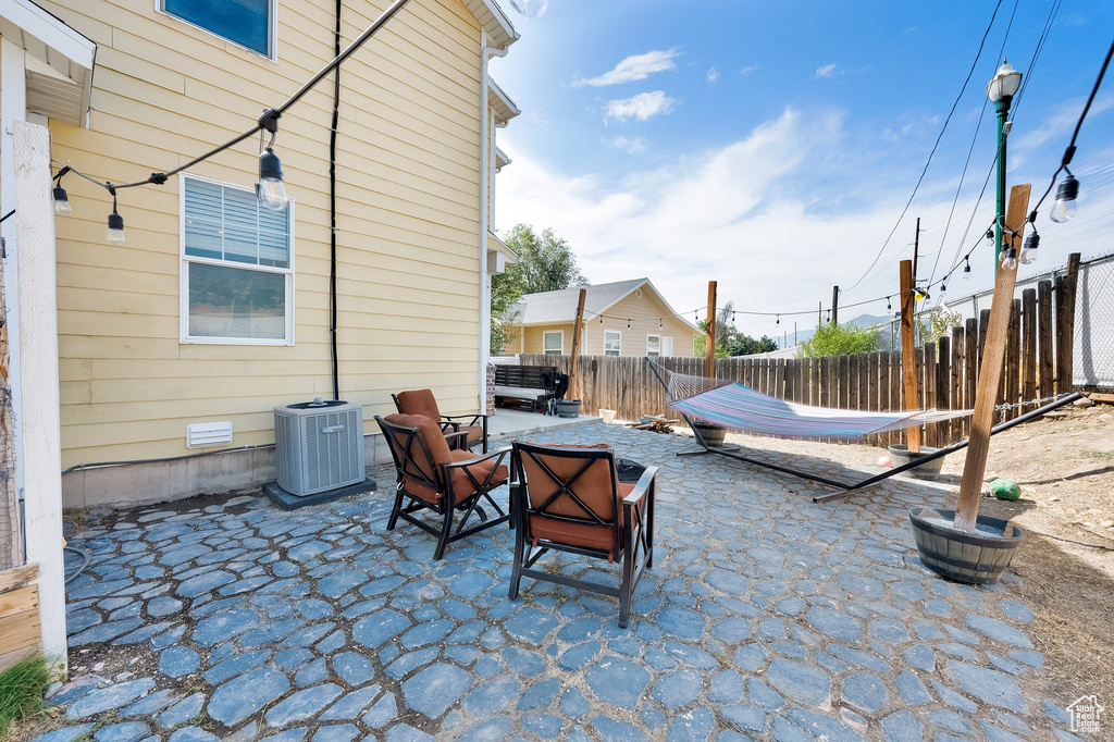 Fenced backyard featuring a patio