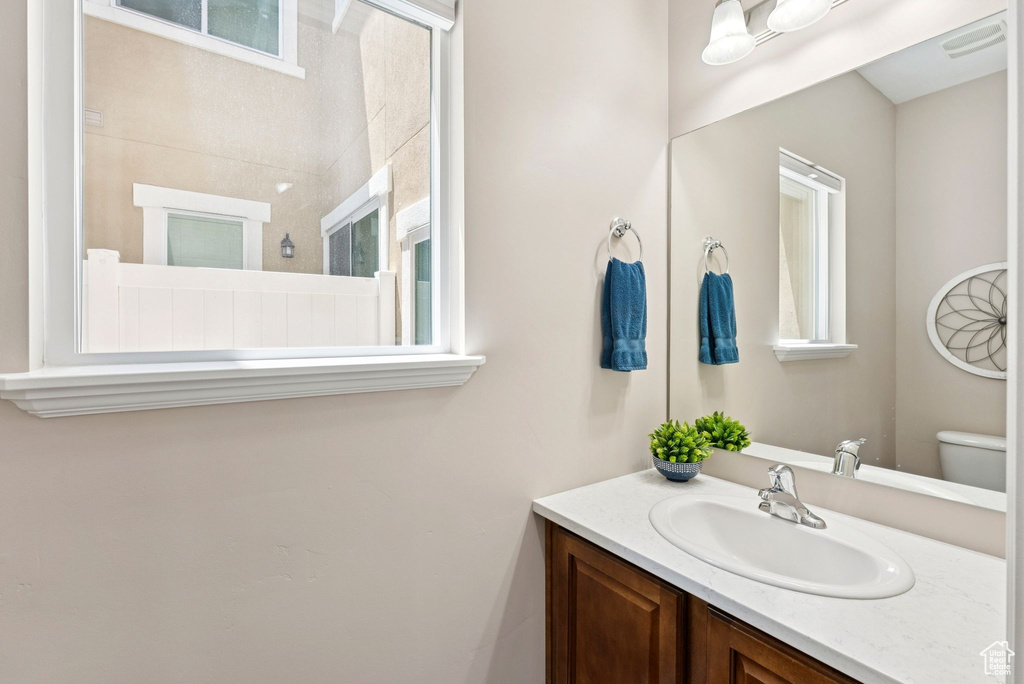 Bathroom with toilet and vanity