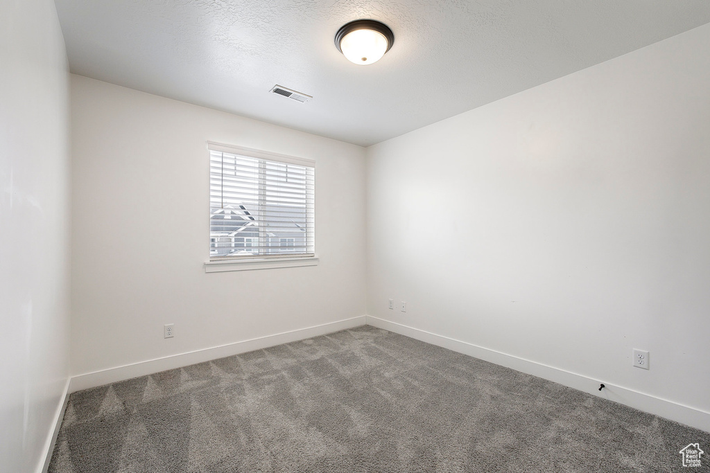 Spare room with carpet