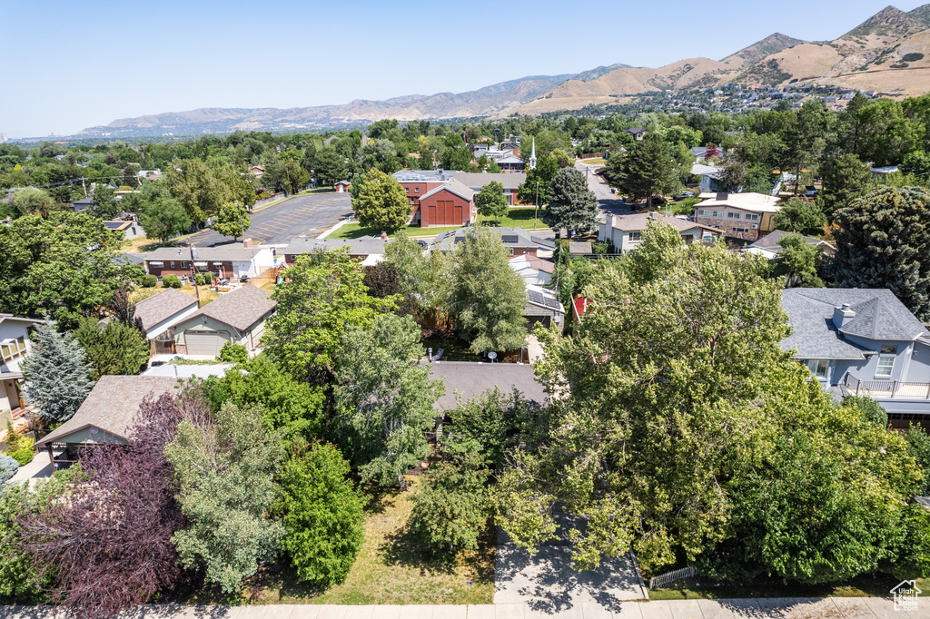 Aerial view of residential area featuring mountains