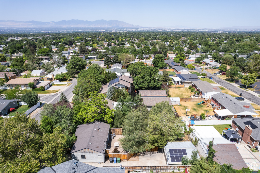 Aerial view of residential area with a mountainous background