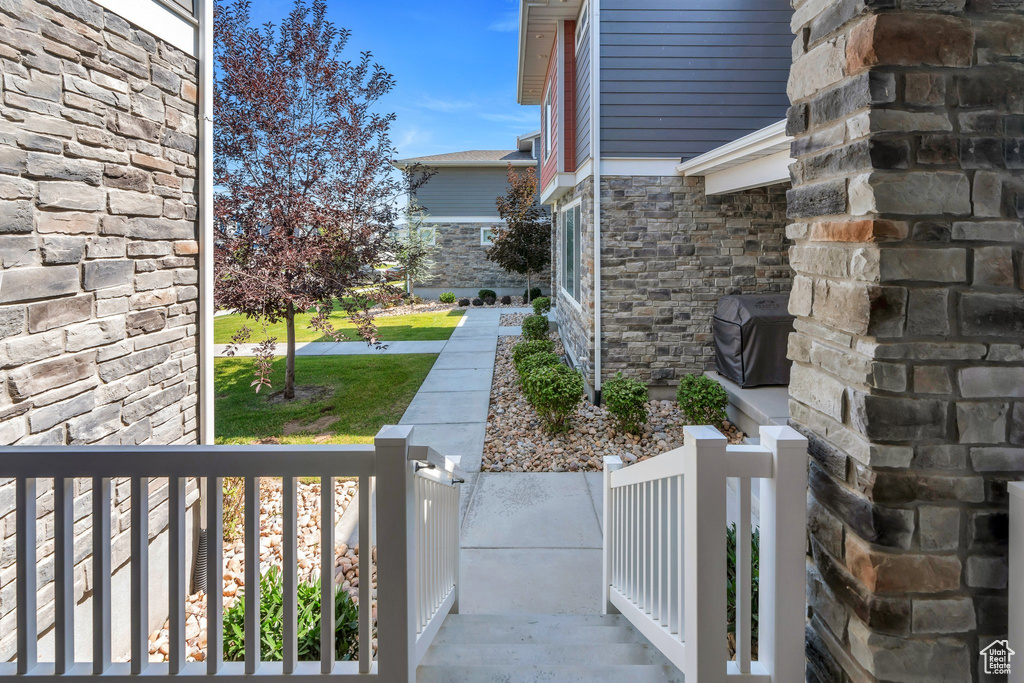 View of yard featuring covered porch