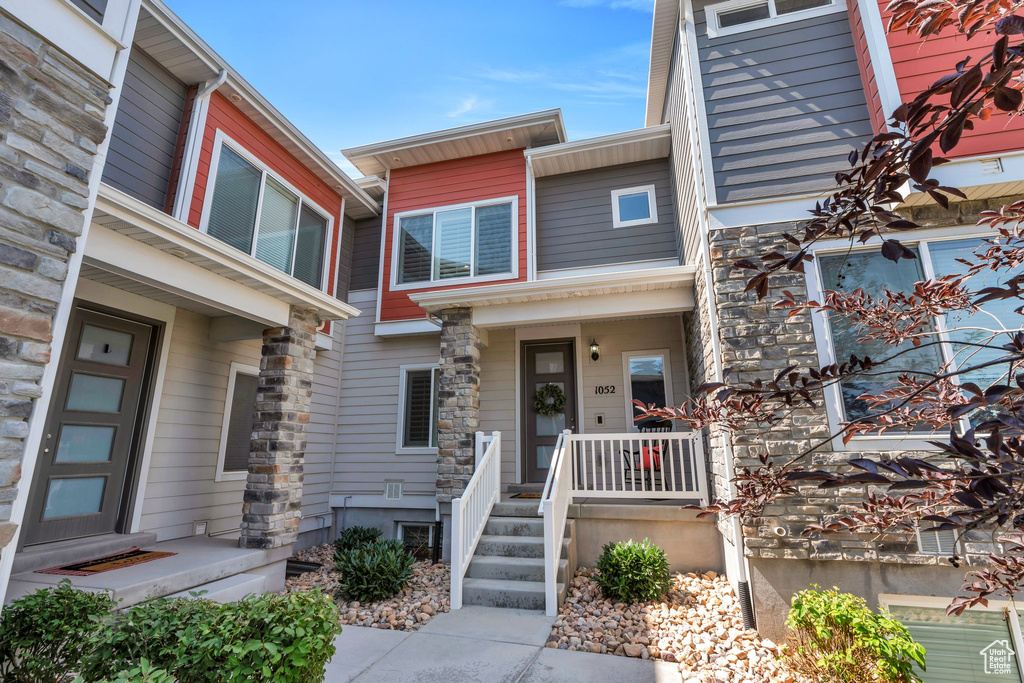 View of front of property featuring stone siding