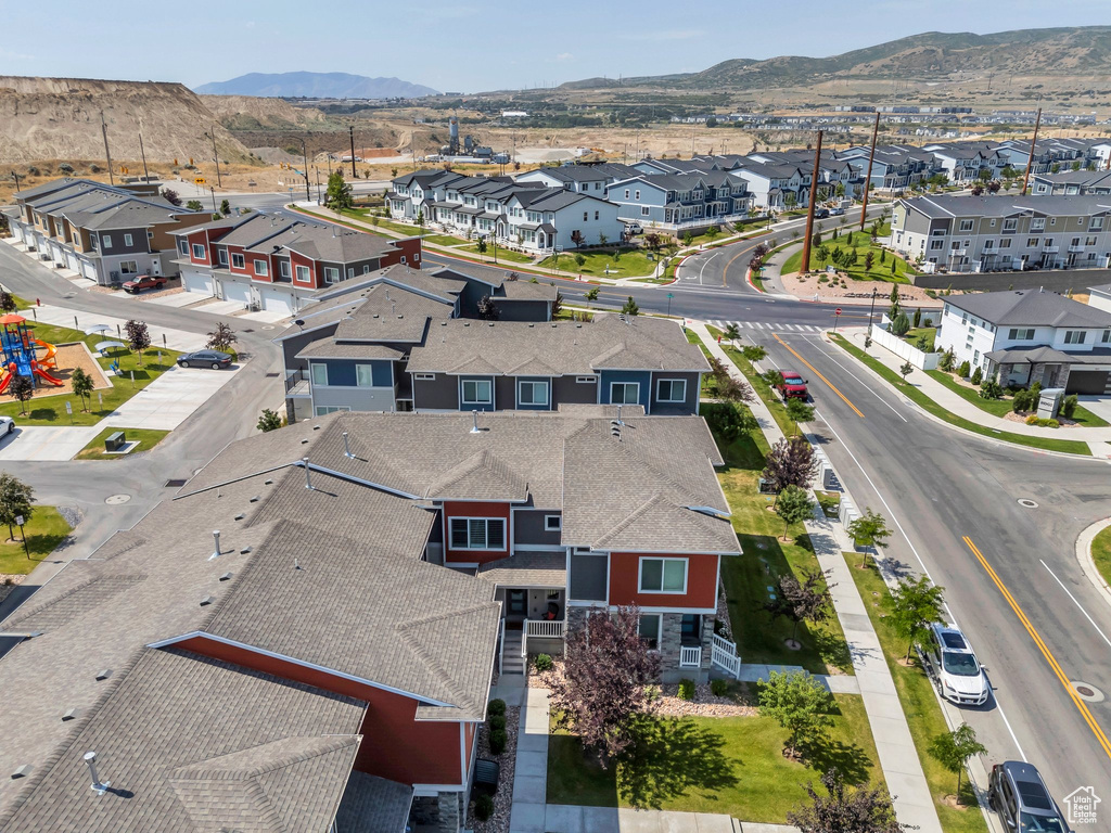 Aerial view of residential area featuring mountains