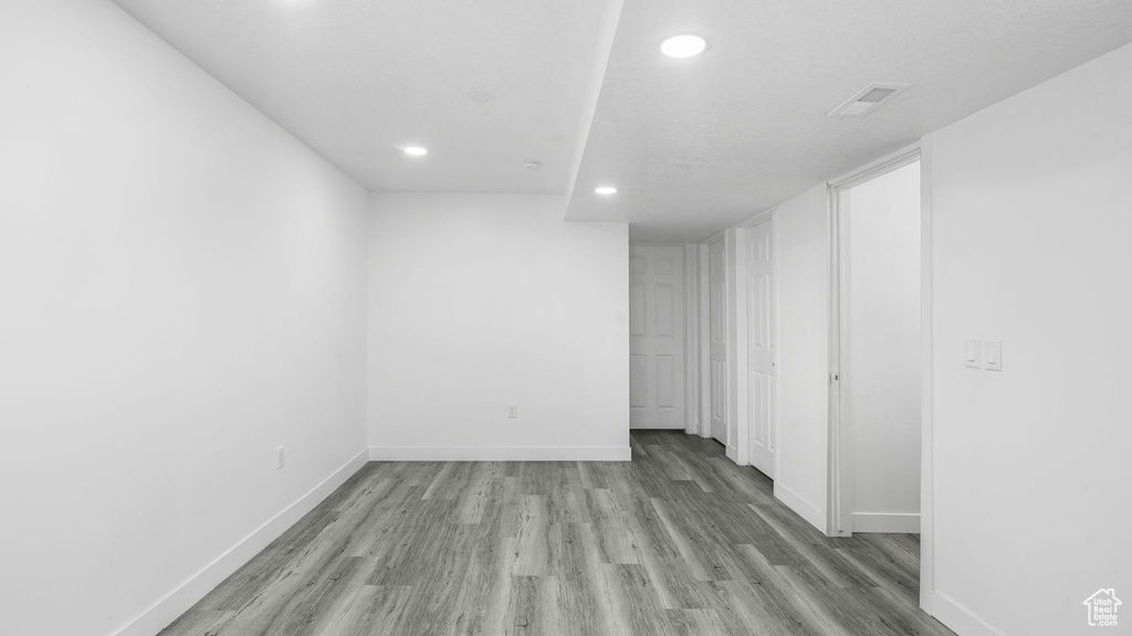 Spare room with recessed lighting and light wood-style floors