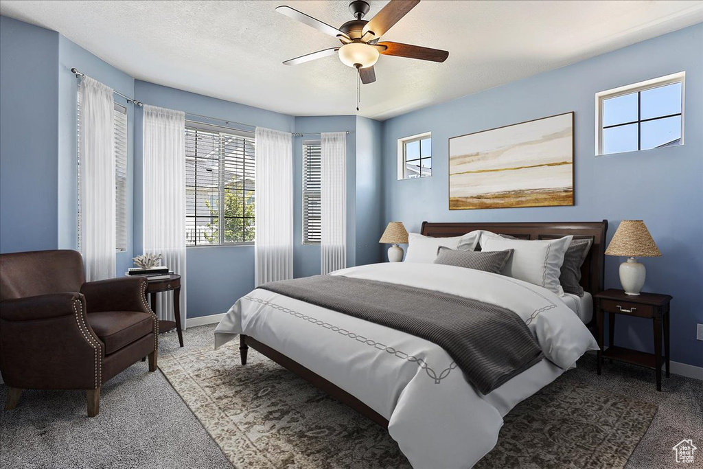 Bedroom with carpet floors and ceiling fan