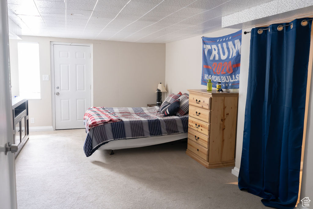 Bedroom featuring carpet