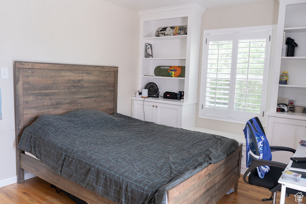 Bedroom featuring wood finished floors