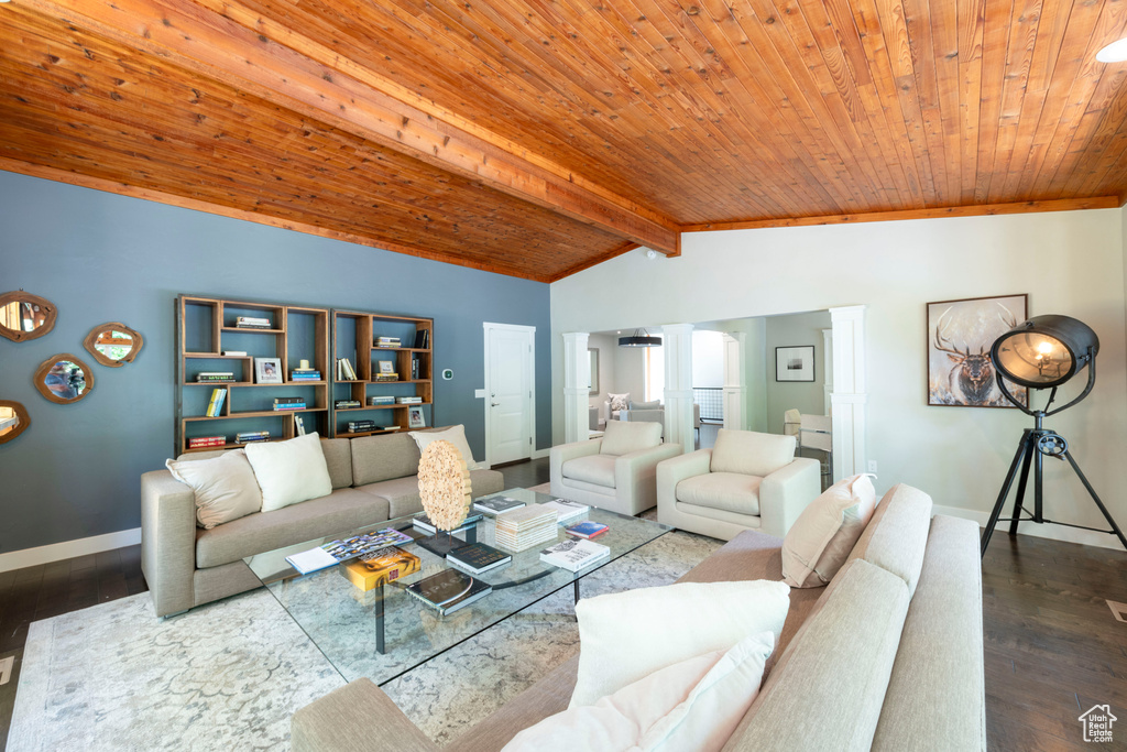 Living area featuring wood finished floors and wood ceiling