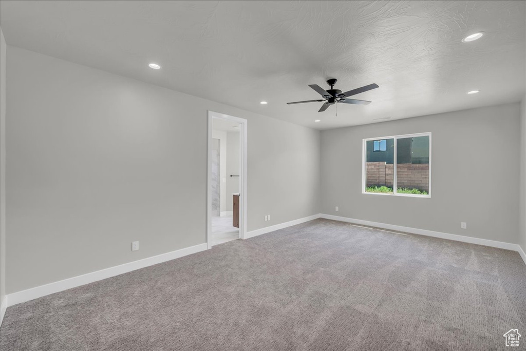 Unfurnished room featuring recessed lighting, carpet flooring, and a ceiling fan