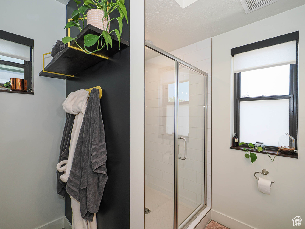 Bathroom featuring a stall shower
