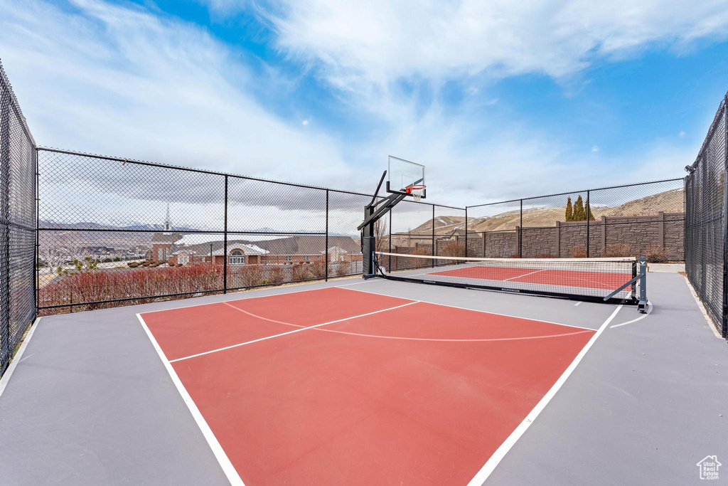 View of basketball court featuring community basketball court