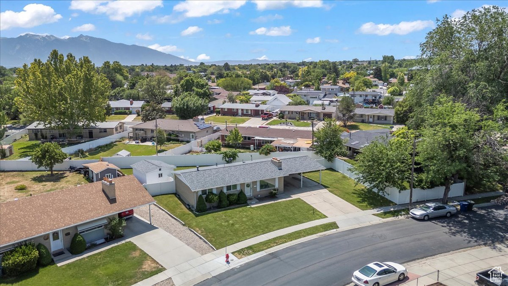 Aerial view of residential area with mountains