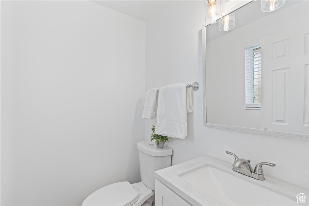 Half bath with toilet and vanity