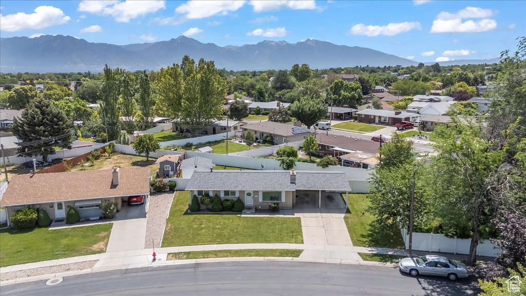Aerial view of residential area with a mountain backdrop