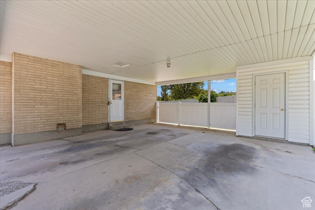 View of patio / terrace with a carport