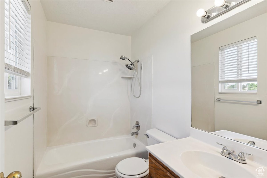Full bathroom featuring vanity and shower / bath combination
