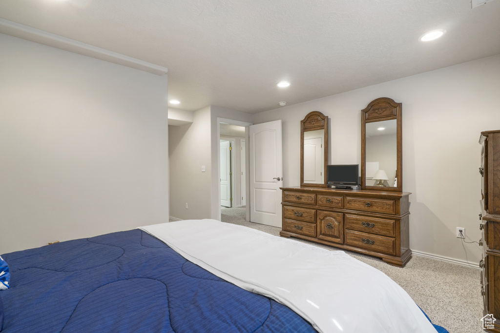 Bedroom featuring carpet flooring and recessed lighting