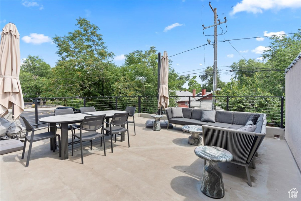 View of patio / terrace featuring an outdoor hangout area and outdoor dining space