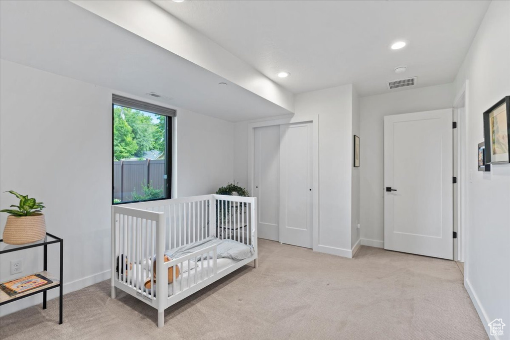 Bedroom featuring carpet and recessed lighting