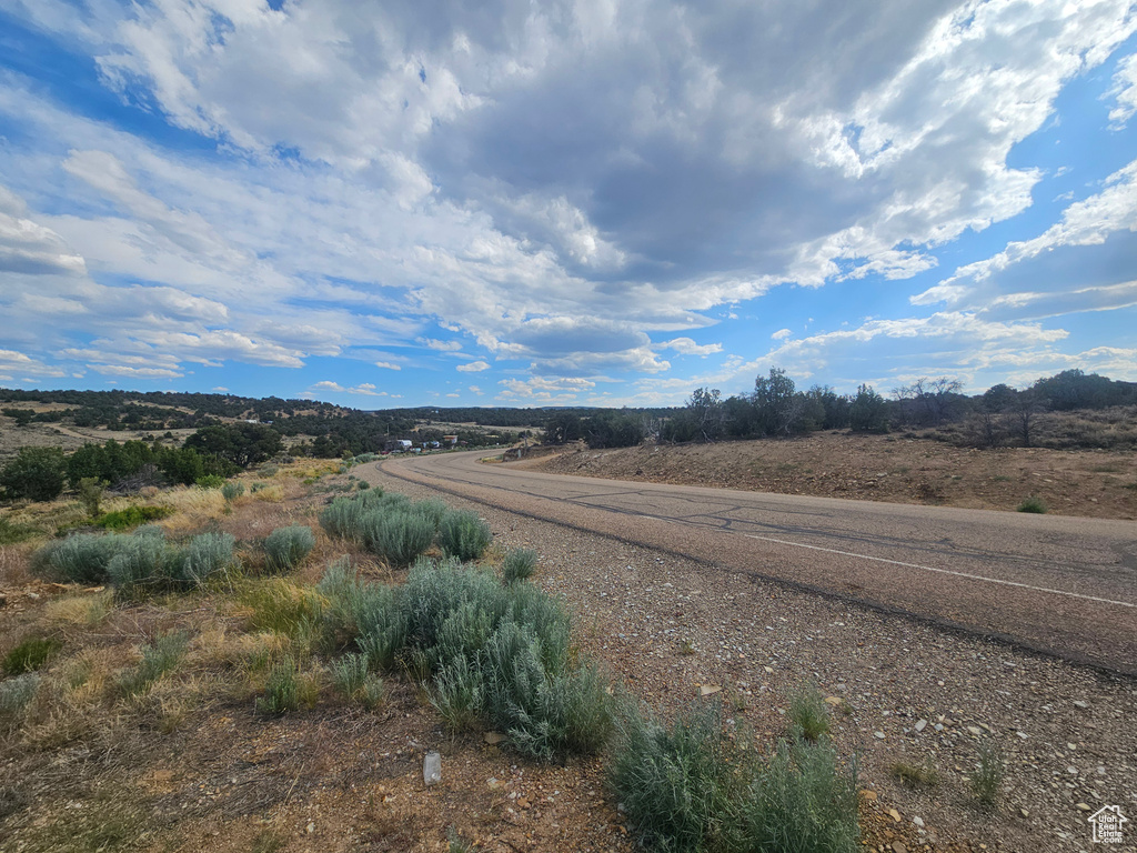 View of asphalt road featuring a rural view