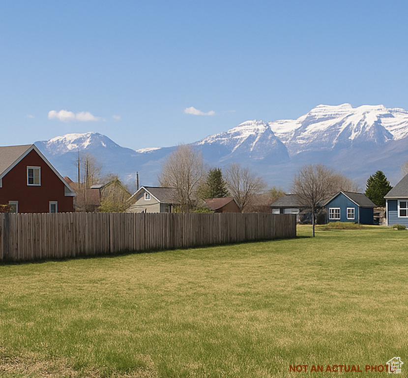 View of yard with a mountain view