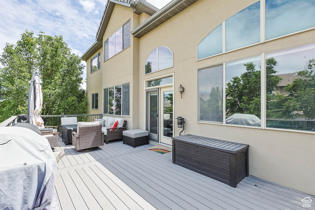 Wooden deck with outdoor lounge area
