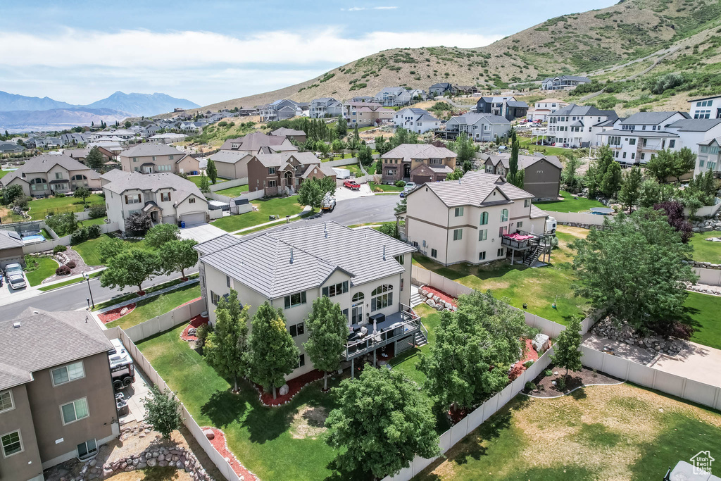 Aerial view of residential area with mountains