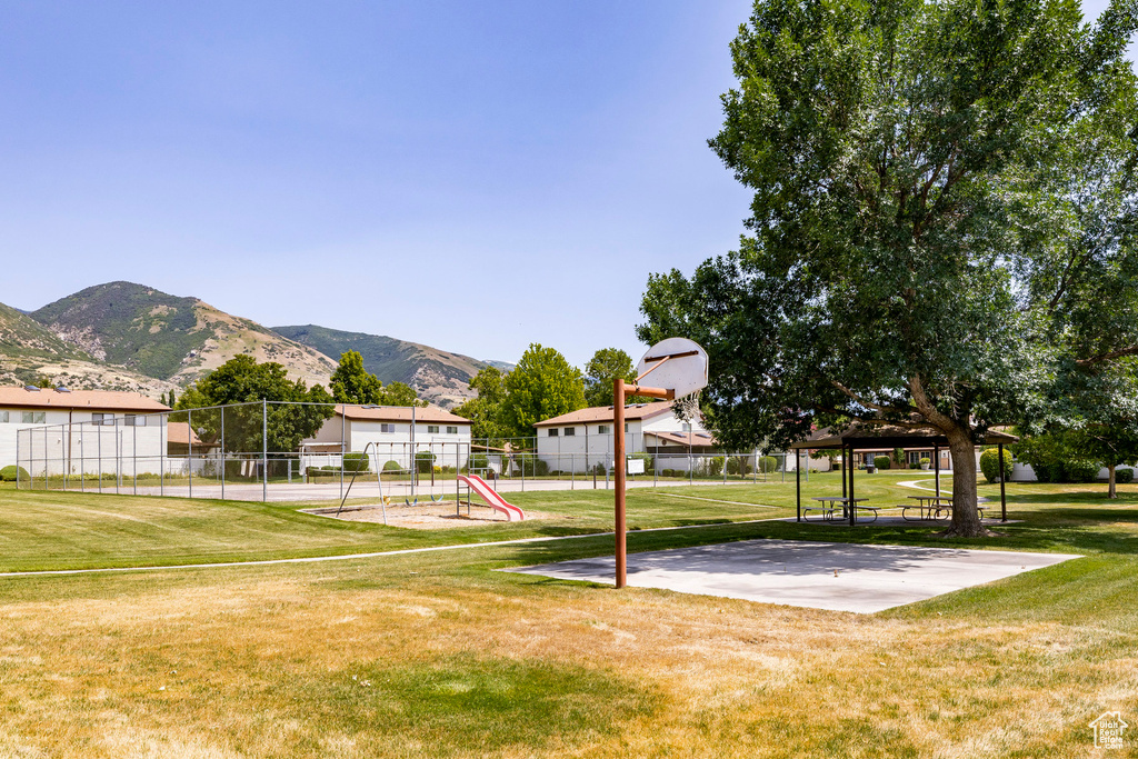 View of basketball court with a mountain view and a gazebo